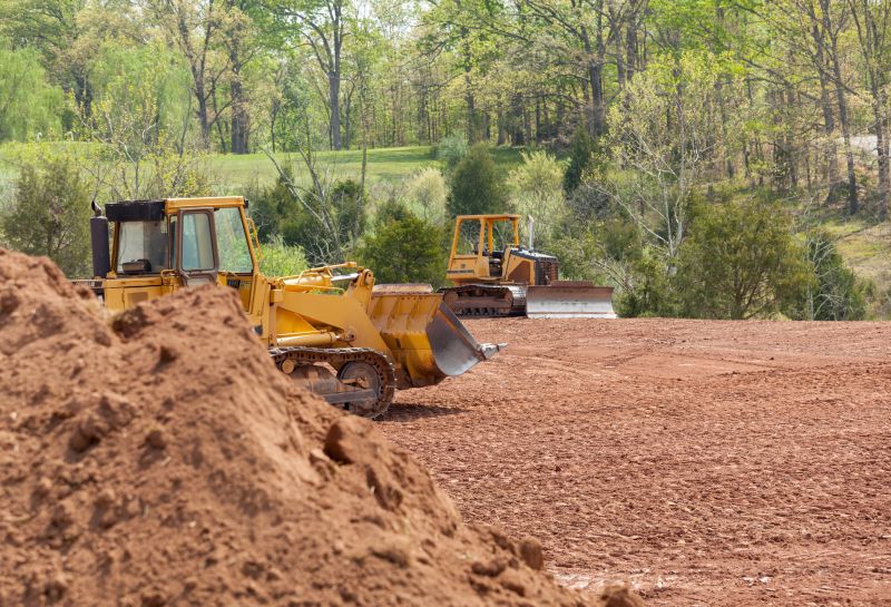Prepares sites for building